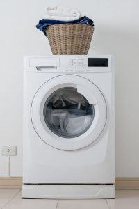 Filling more than the capacity of the washing machine 200x300 - چرا لباس ها بعد از شستشو بو می دهند ؟
